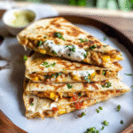 Cheesy Elote Quesadilla with Cumin Lime Crema